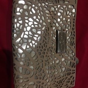 Ivanka Trump gold card holder clutch